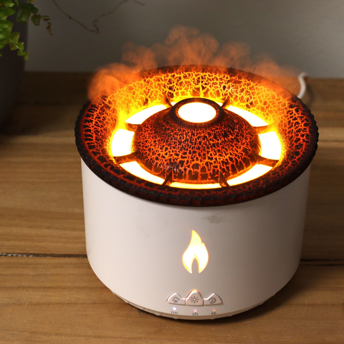 Medium volcano effect aroma diffuser with a lava-like top and flame light.