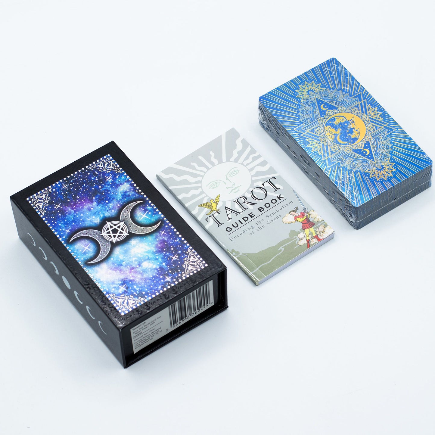 Blue foil tarot card set with moon face design and booklet.