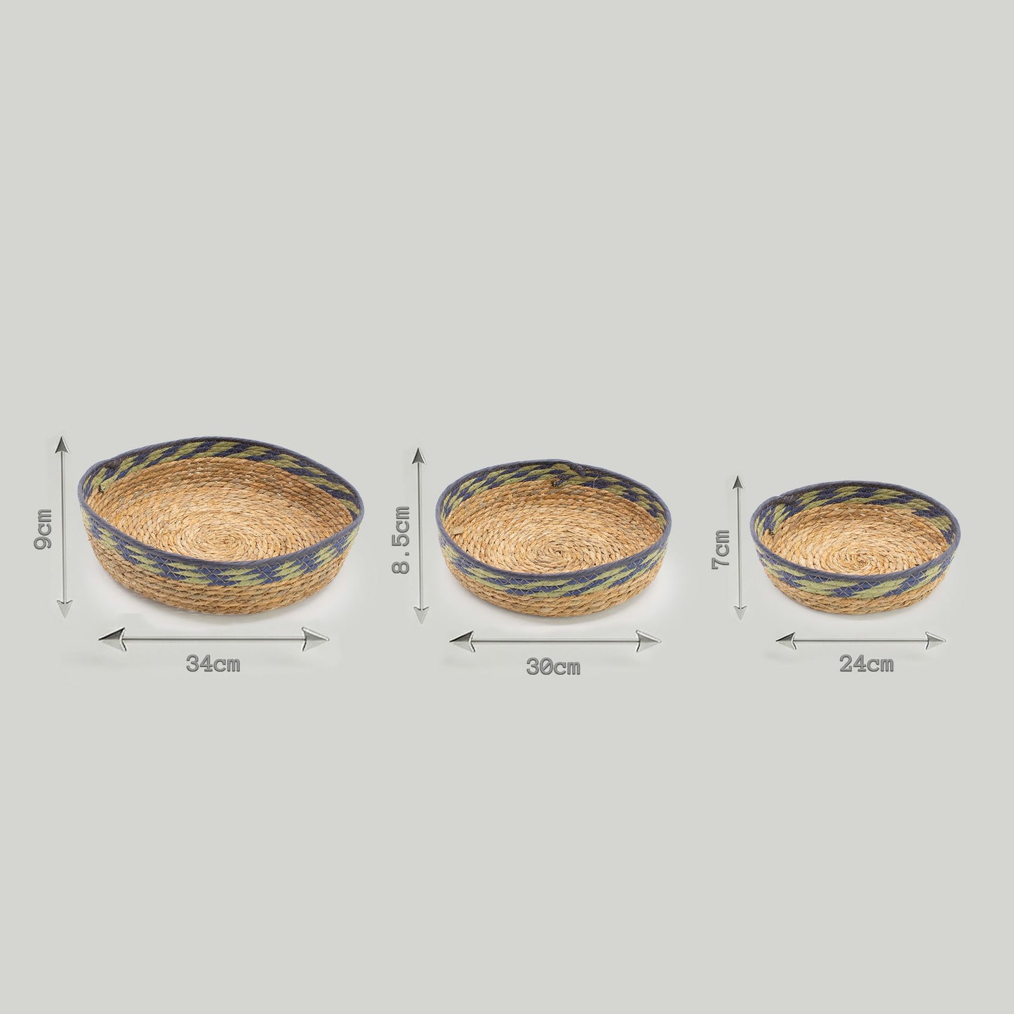 Set of 3 natural straw and seagrass tray baskets with green and blue detailing.