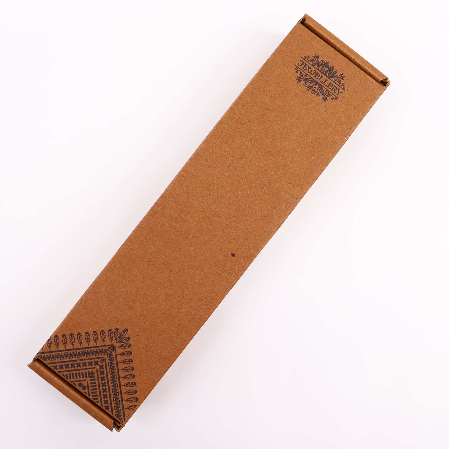 Brown cardboard box with "JEWELLERY" printed on it and decorative patterns.