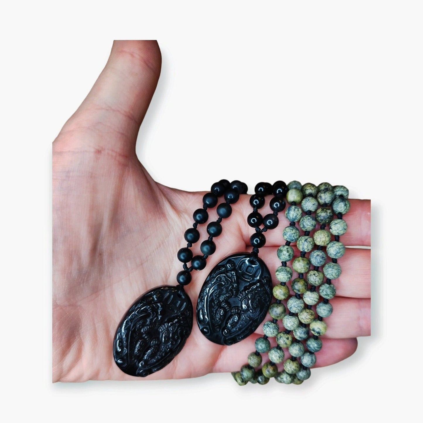 Handgeknüpfte Malakette aus Obsidian und Serpentin mit geschnitztem Drachenanhänger. - Flow of Passion