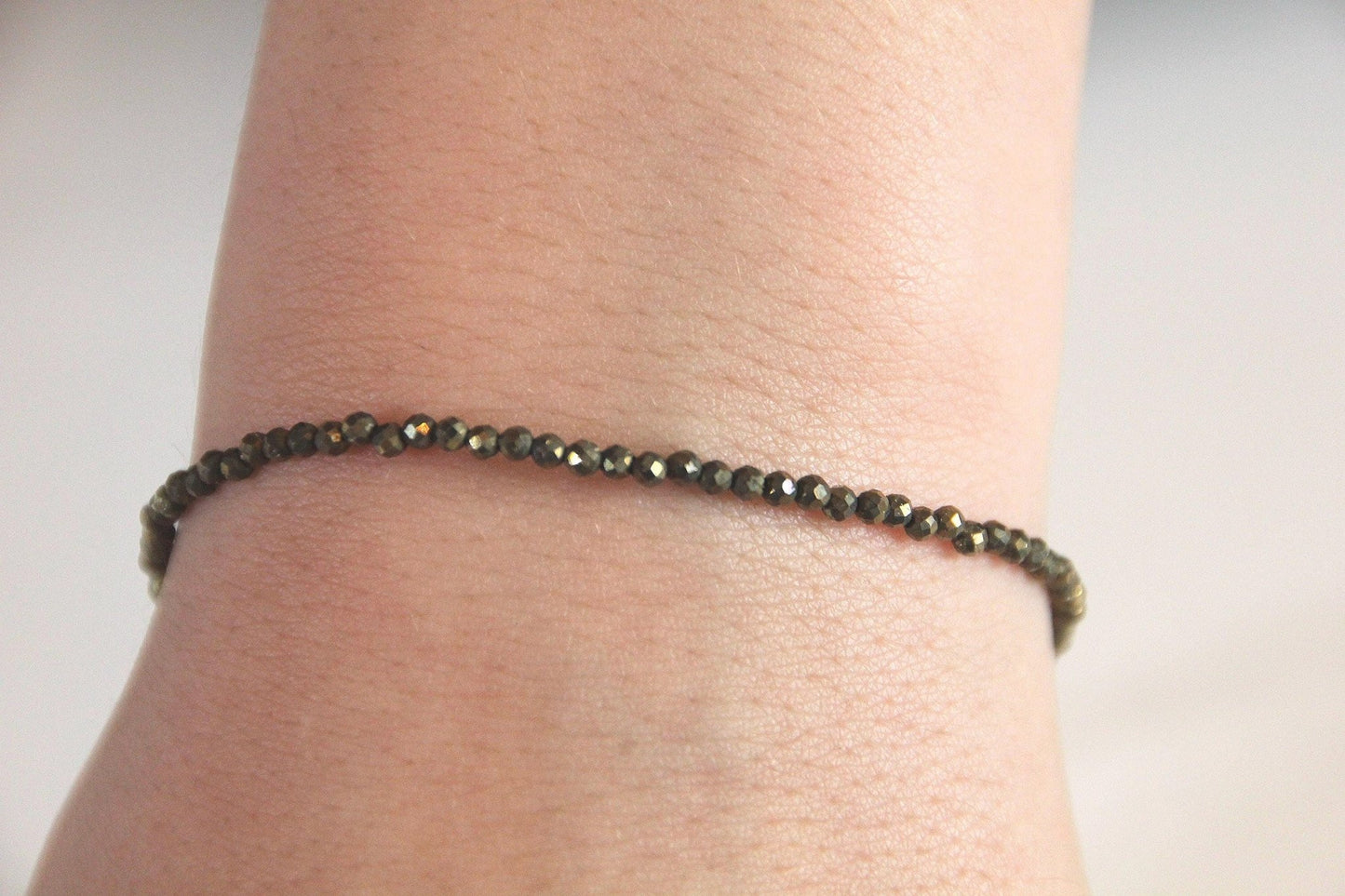 Heilsteinarmband aus Pyrit und Edelstahl - Flow of Passion