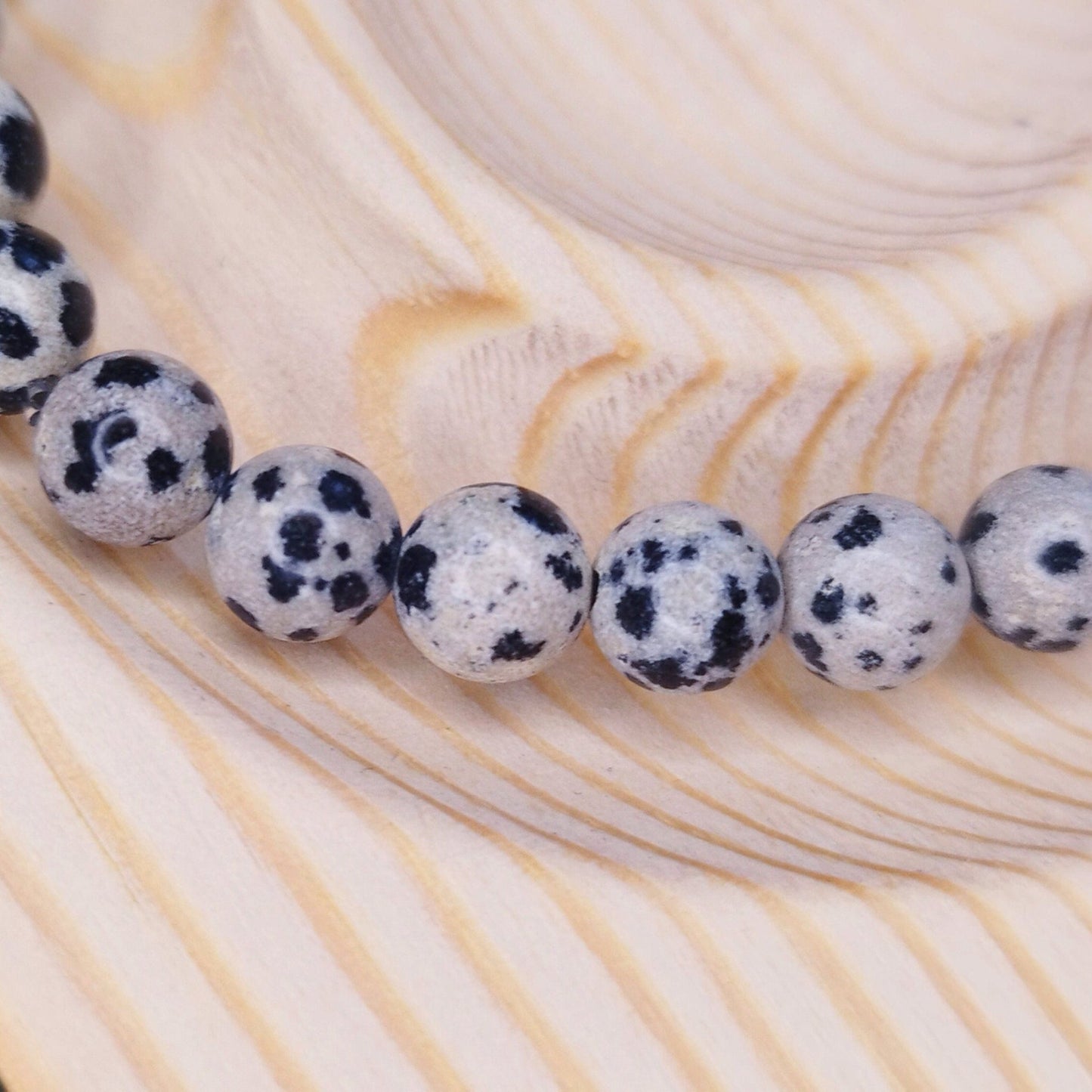 Heilsteinarmband Dalmatinerjaspis 6mm - Flow of Passion