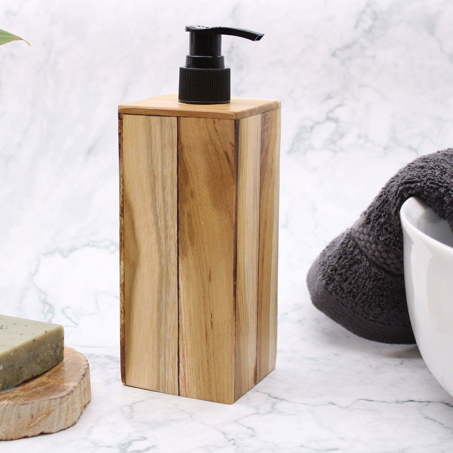 Natural teakwood square soap dispenser with a black pump.
