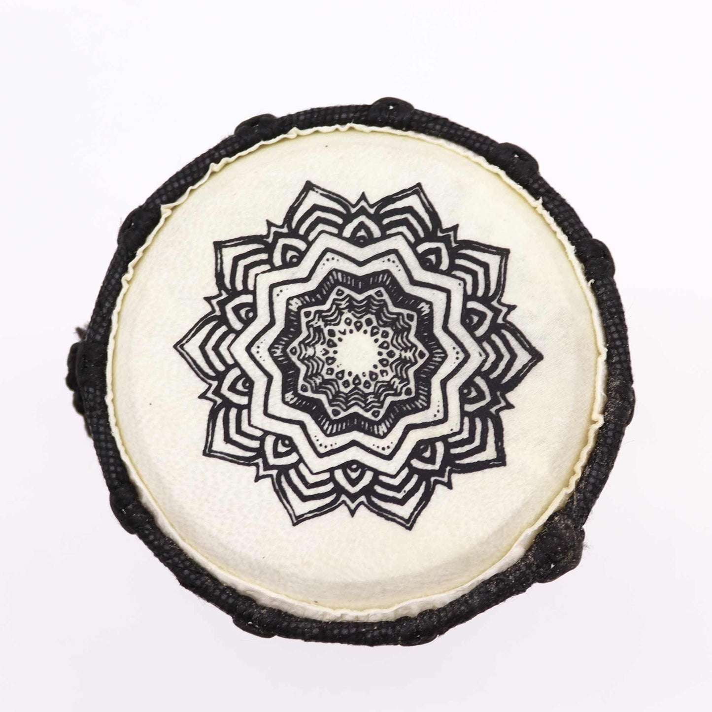 Handmade 15cm djembe drum with black rope trim and a black mandala design.
