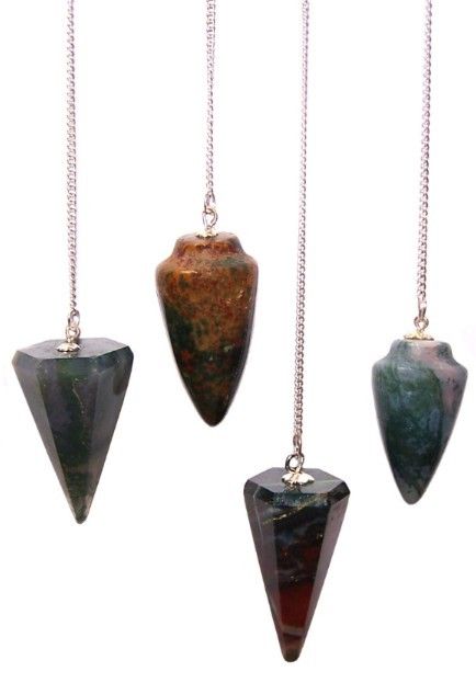 Four bloodstone pendulums with silver chains hang against a white background.