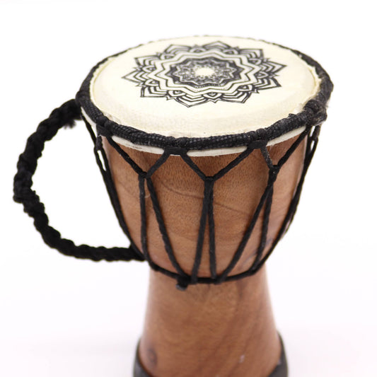 Handmade wide top djembe drum with a mandala symbol.