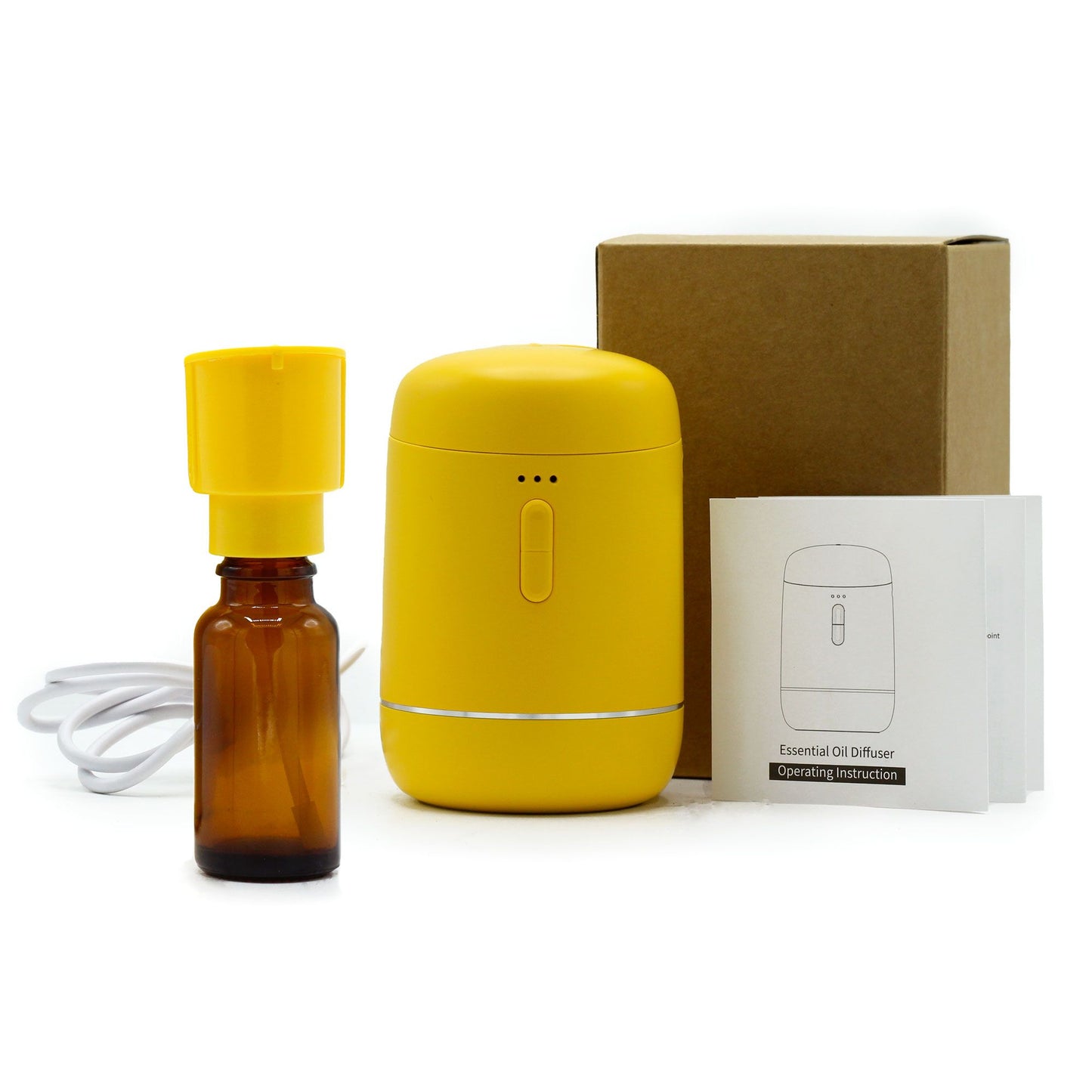 Gelber, wasserloser Diffusor für ätherische Öle mit Fläschchen und Anleitung.