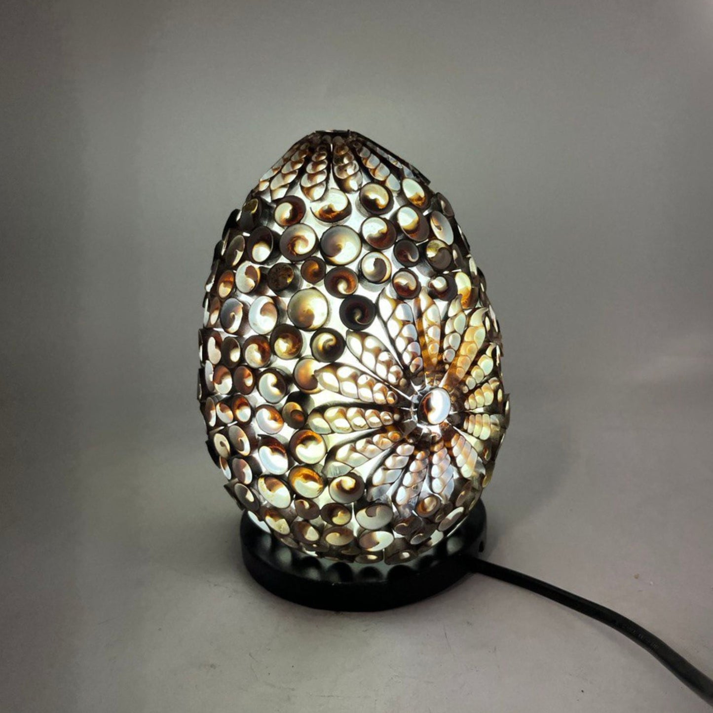 Boho sea shell lamp with a chocolate twist oval design.