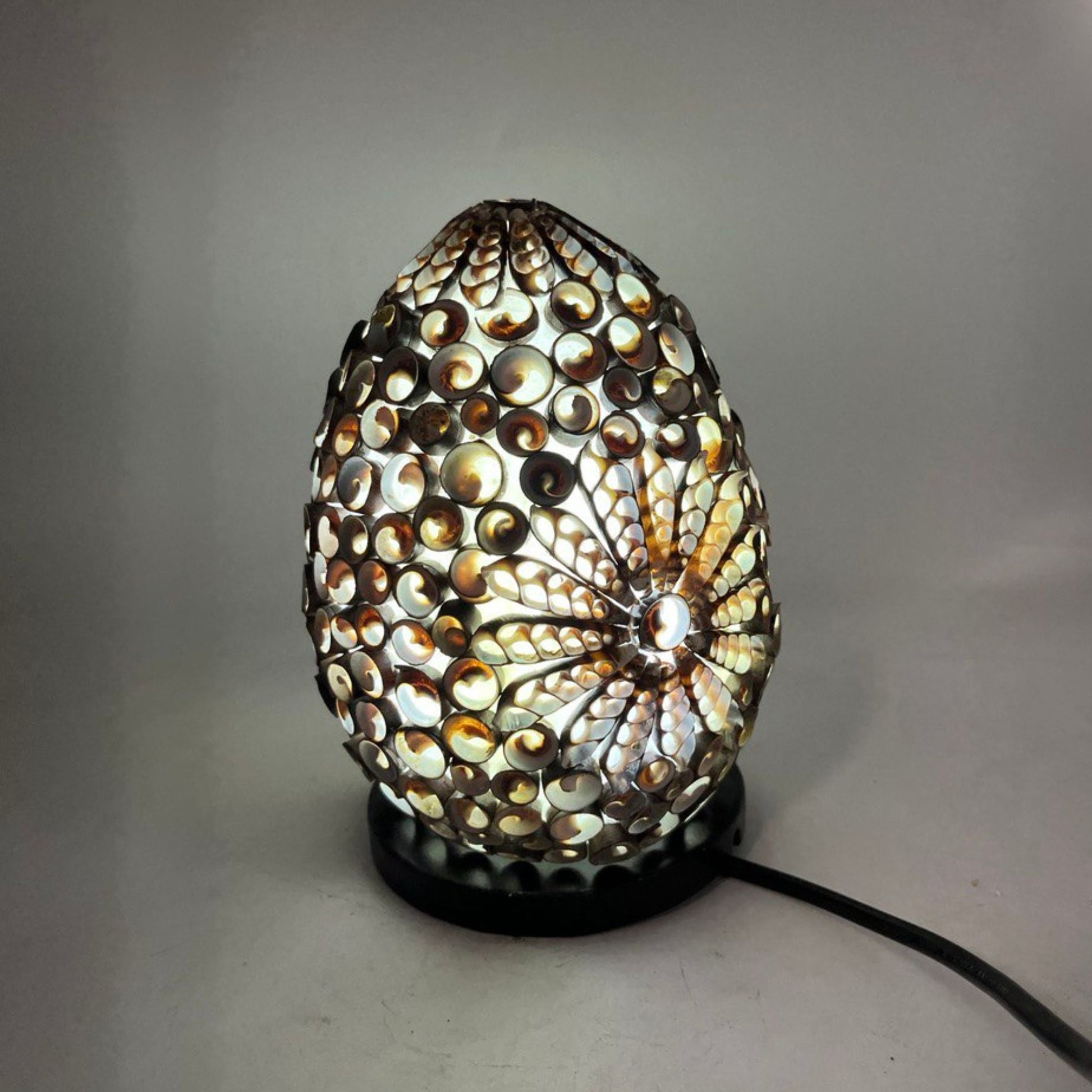 Boho sea shell lamp with a chocolate twist oval design.