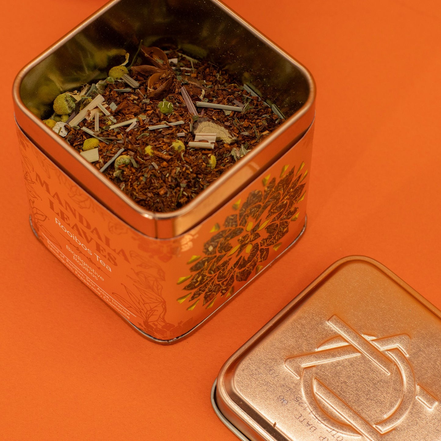 A copper tin of organic rooibos tea with chamomile and star anise.