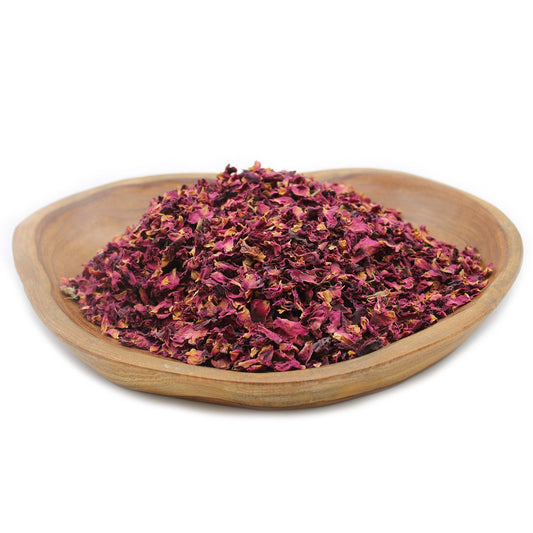 Dried rose petals in a wooden bowl.
