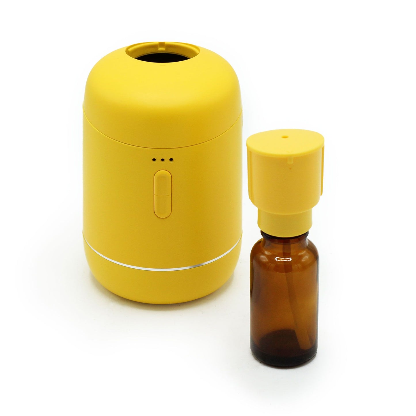 Gelber wasserloser Diffusor für ätherische Öle mit brauner Ölflasche.