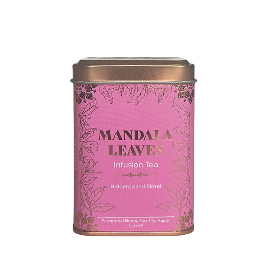 Eine rosa Dose Mandala Leaves Infusion Tea mit goldenem Blattmuster.