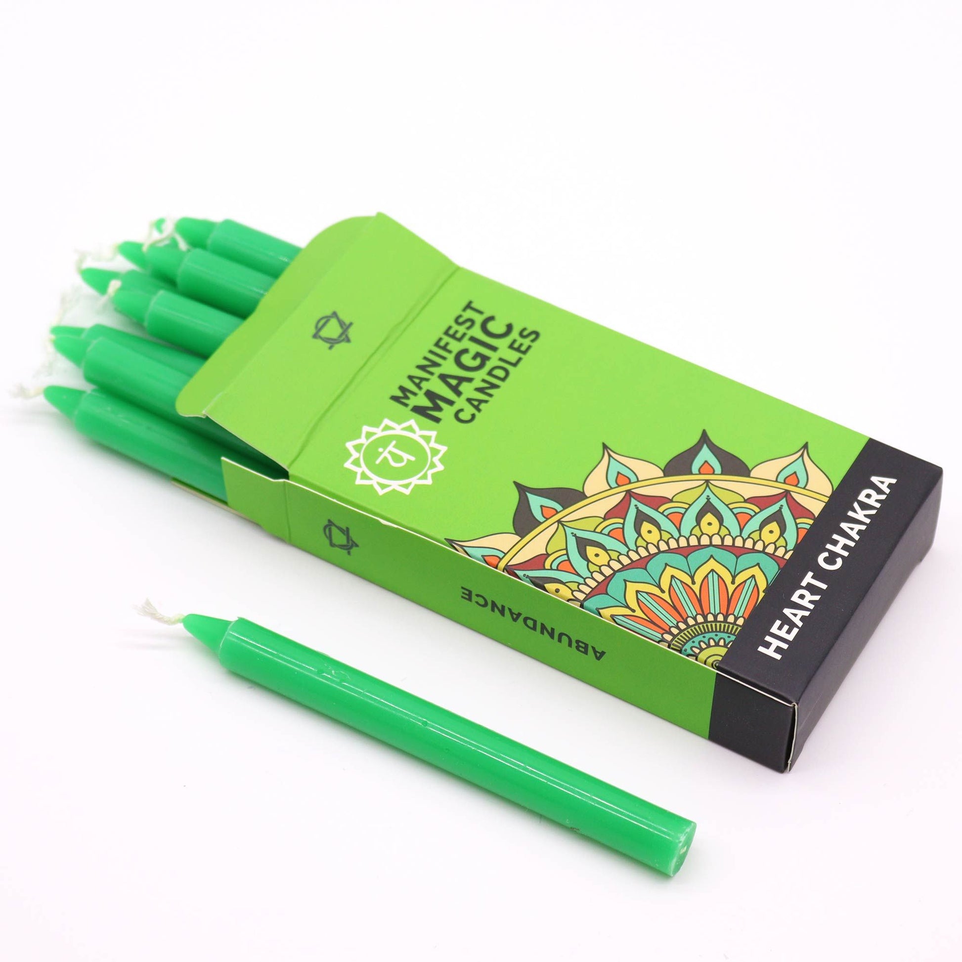 Grüne Manifestationskerzen im Karton mit Mandala-Design und Aufschrift "Heart Chakra".