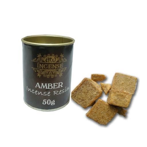 Amber Räucherharz in einer 50g Dose mit mehreren Harzstücken daneben.