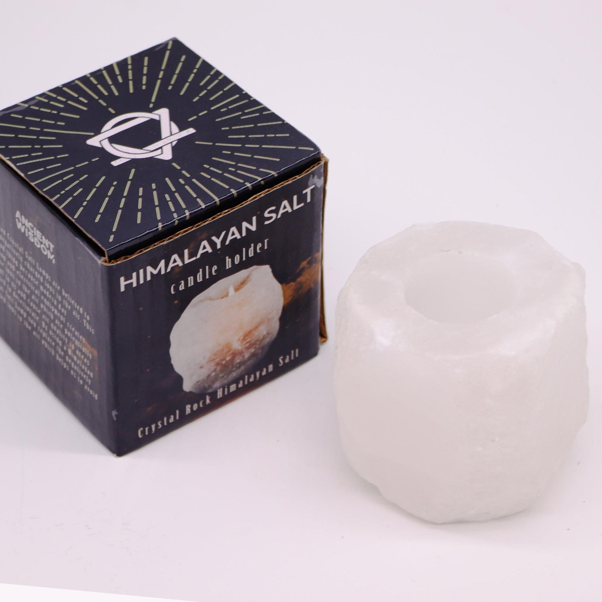Himalayan salt candle holder with a rough, natural finish.