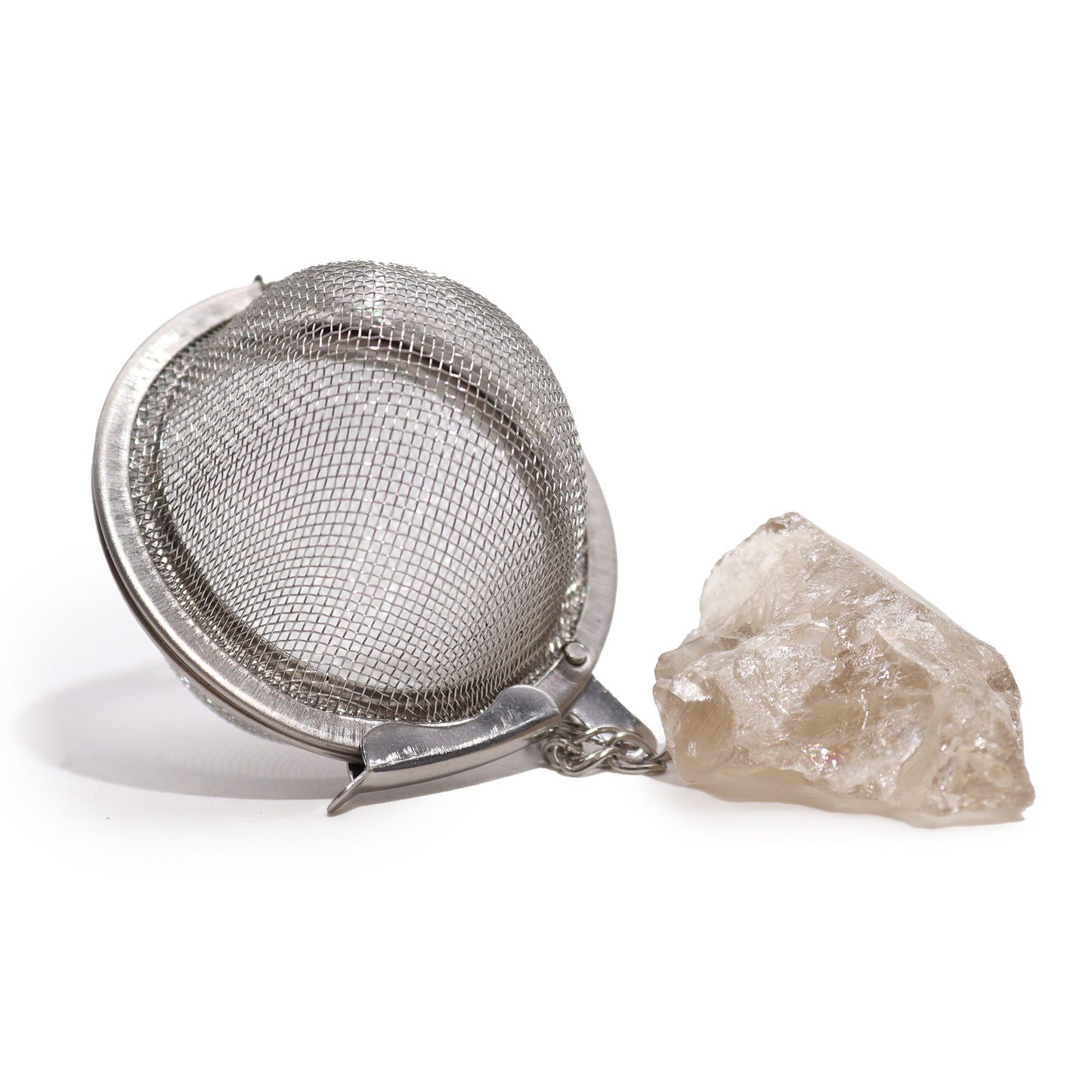 Edelstahl-Teesieb mit einem ungeschliffenen Rauchquarz-Kristall.