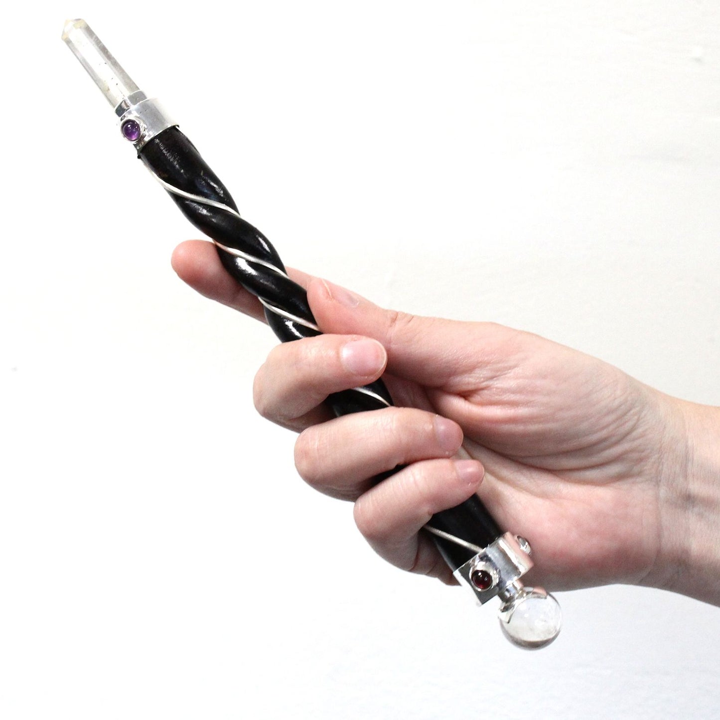 Twisted healing wand with silver, amethyst, and a sphere.