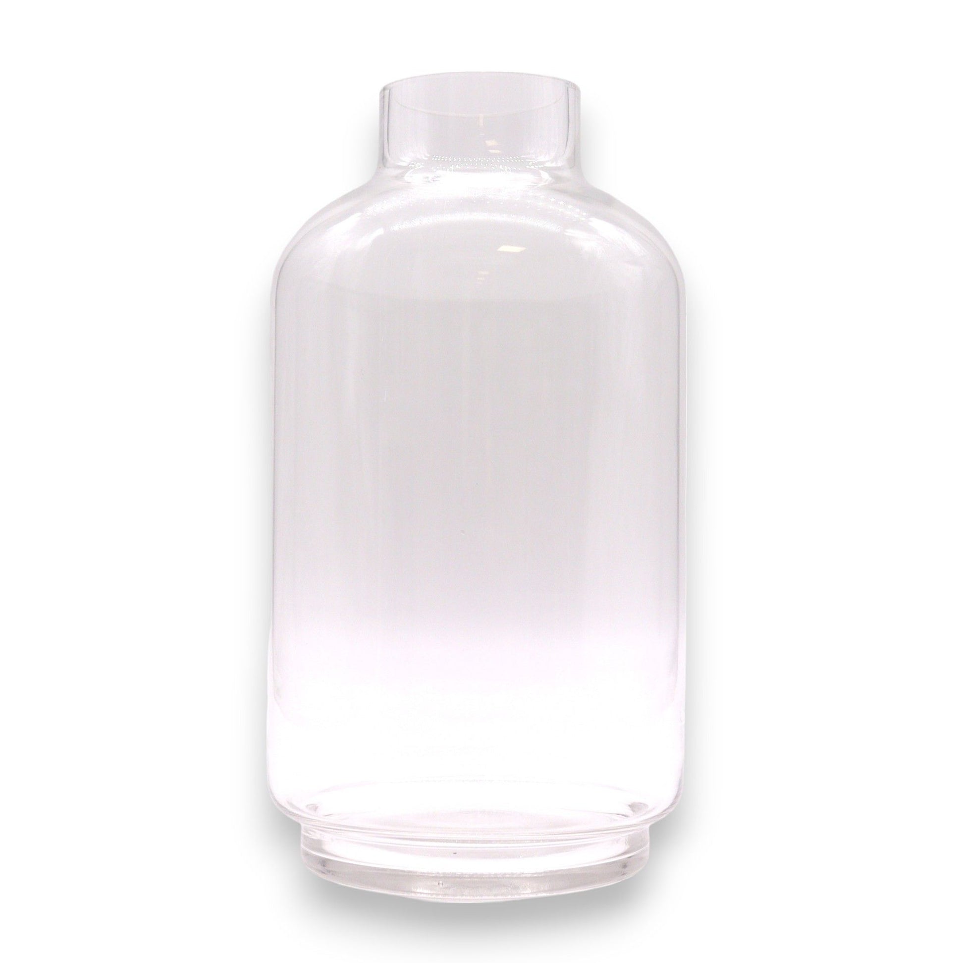 Clear glass bottle with a rounded top and a flat base.