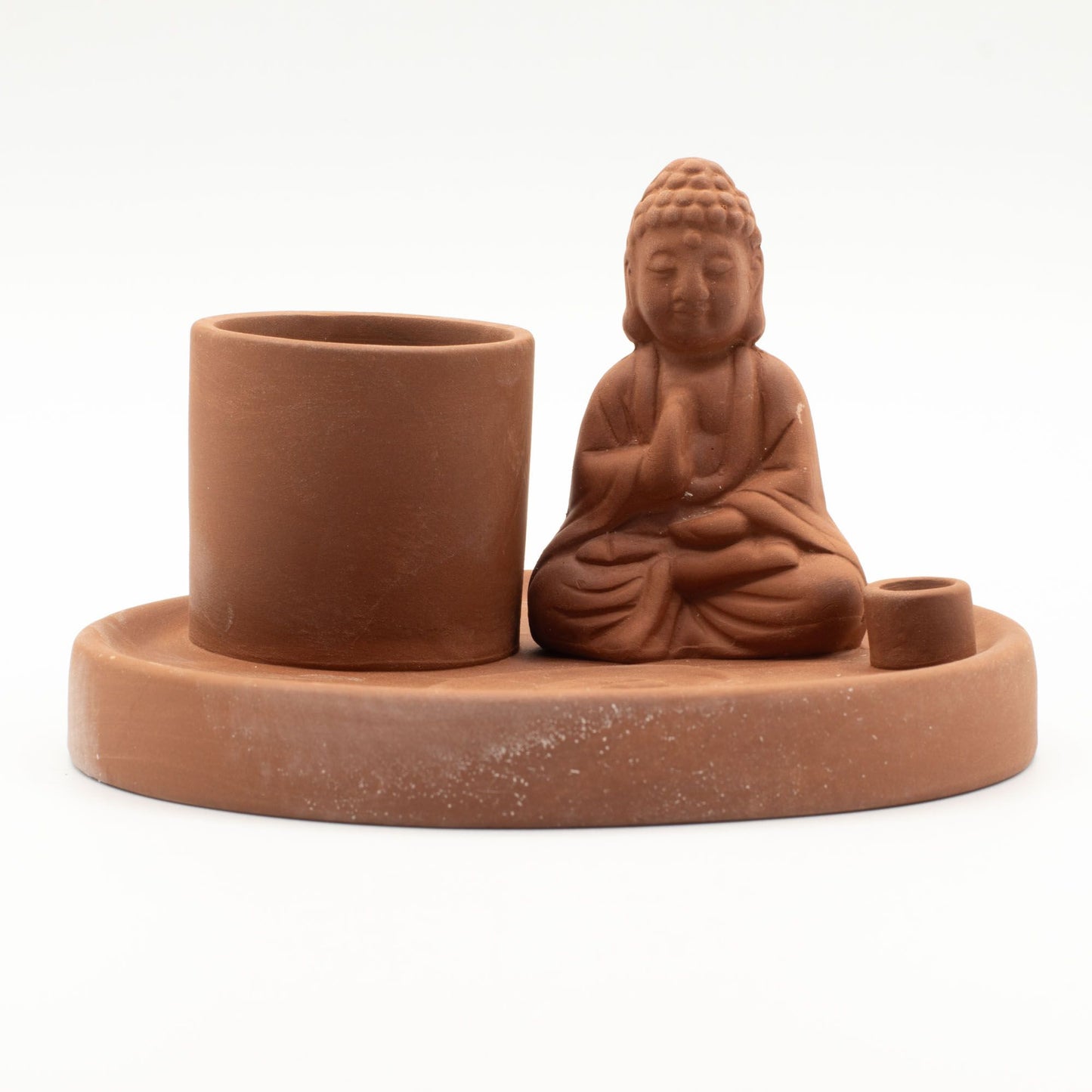 Ein Keramik-Räucherhalter mit Buddha-Figur für verschiedene Räucherwerke.
