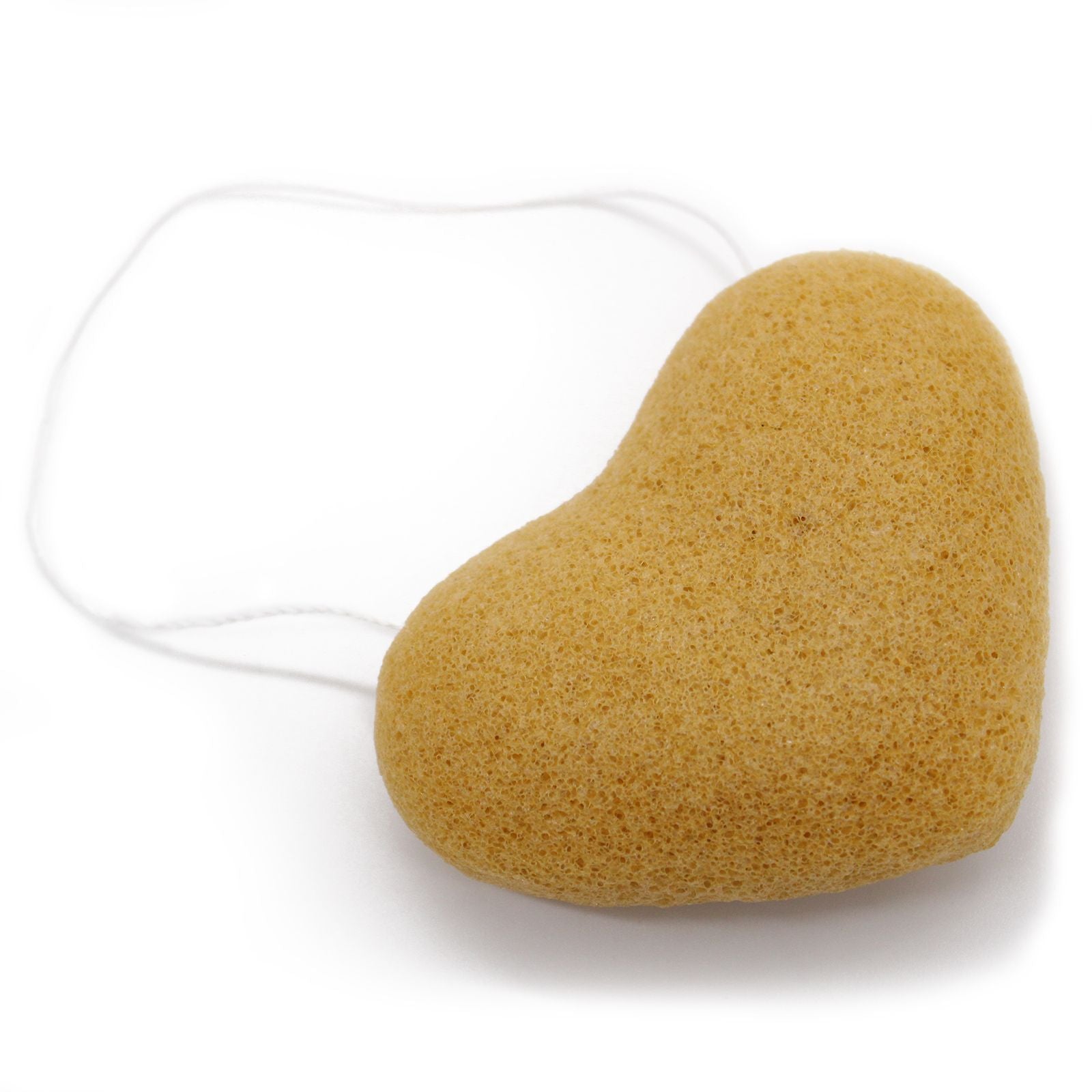 Konjac heart sponge in peach color with a white string.