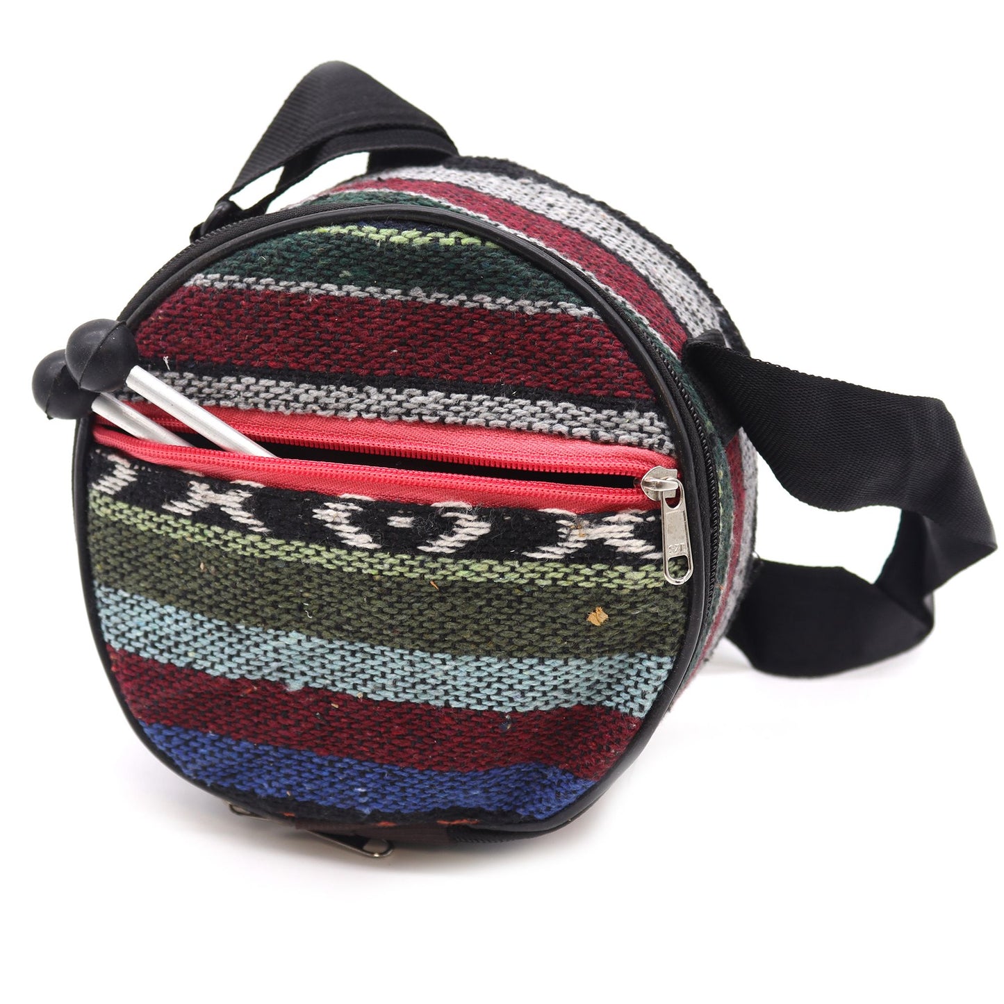 Round bag with colorful stripes and a zipper, holding knitting needles.
