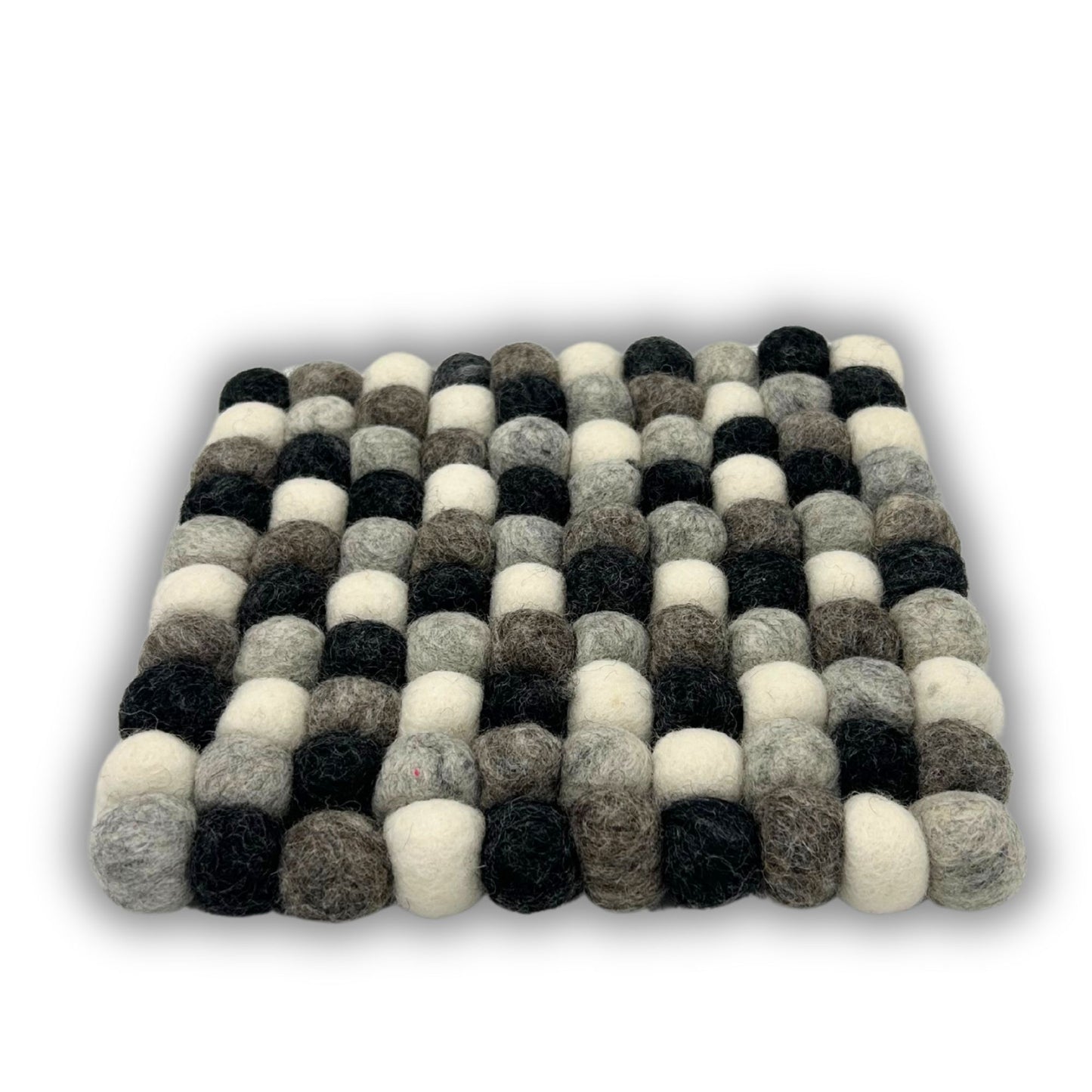 Square placemat made of grey, black, and white felt balls.