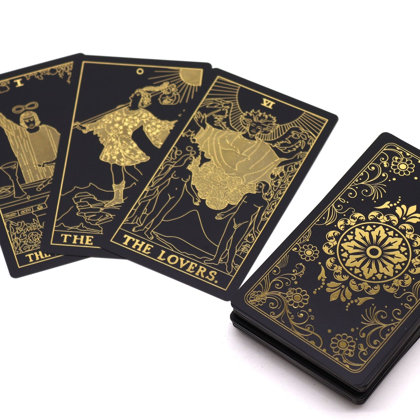 Schwarzes Tarot-Kartenset mit goldener Folienprägung und Geschenkbox.