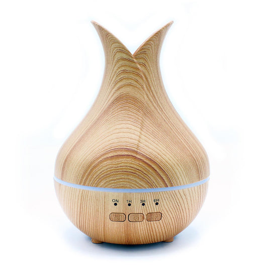Wooden-look essential oil diffuser with timer settings and LED light.