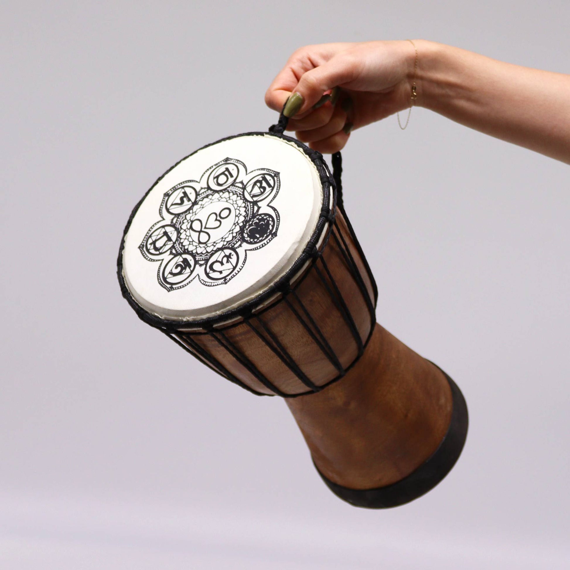 Handmade 30cm wide top djembe drum with chakra design.