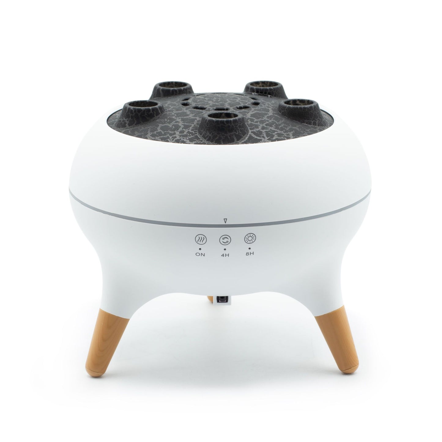 White aroma diffuser with a textured top, four mist outlets, and wooden legs.