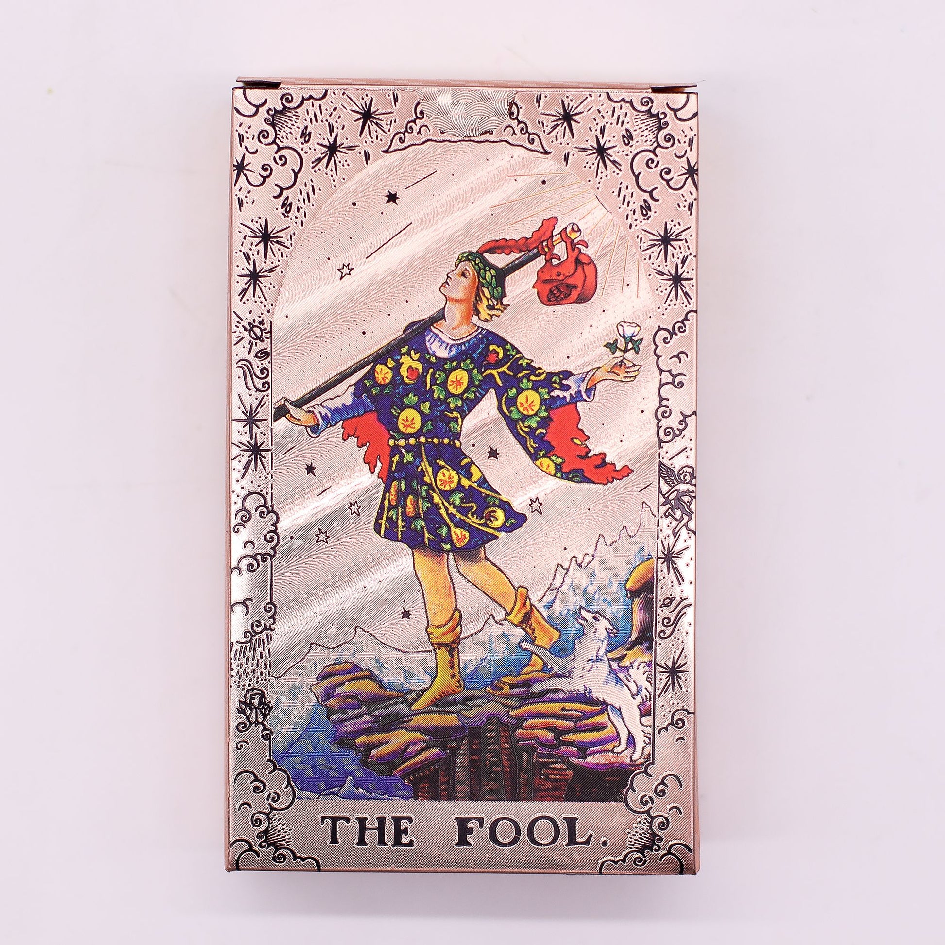 Rosegoldfarbenes Tarotkartenset "The Fool" mit Begleitbuch.
