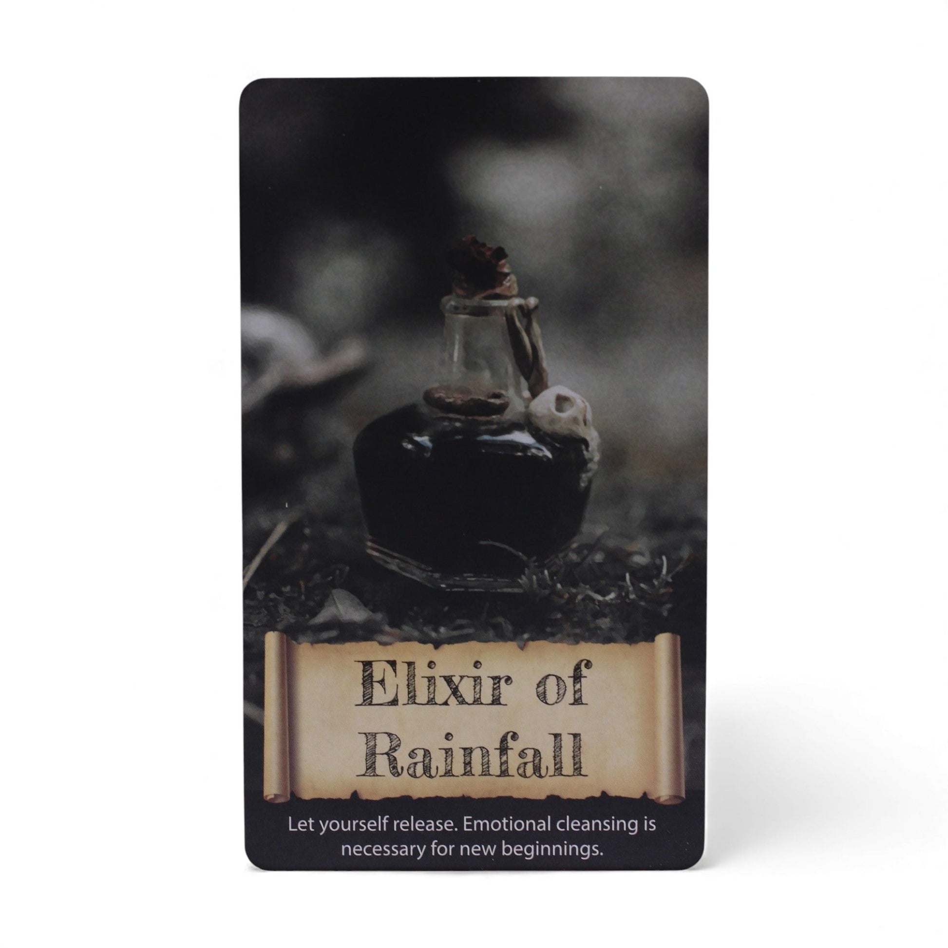 Ein Orakelkartendeck mit 40 Karten, das ein Elixier der Regenfall-Karte zeigt.