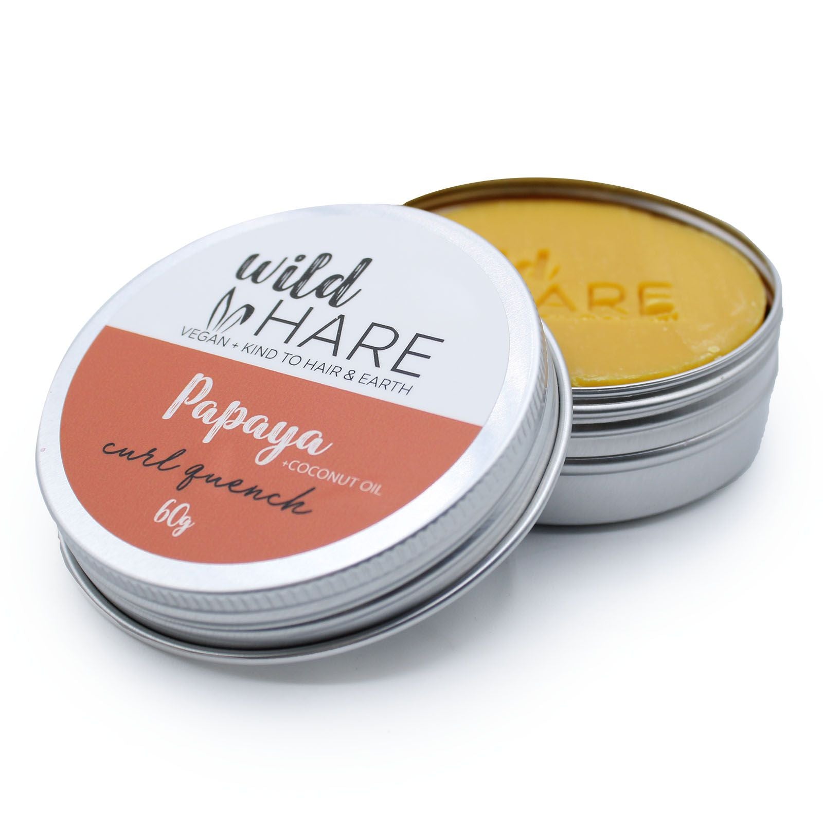 Wild Hare Papaya solid shampoo bar in a tin.