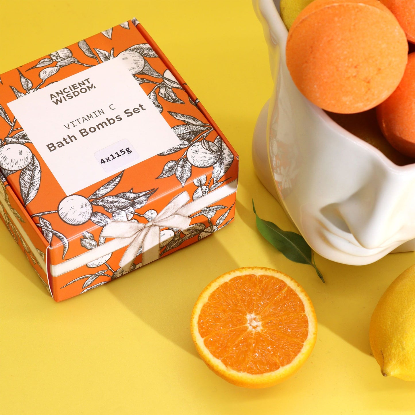 Vitamin C Badebomben-Set mit Orangen- und Zitrusmuster.