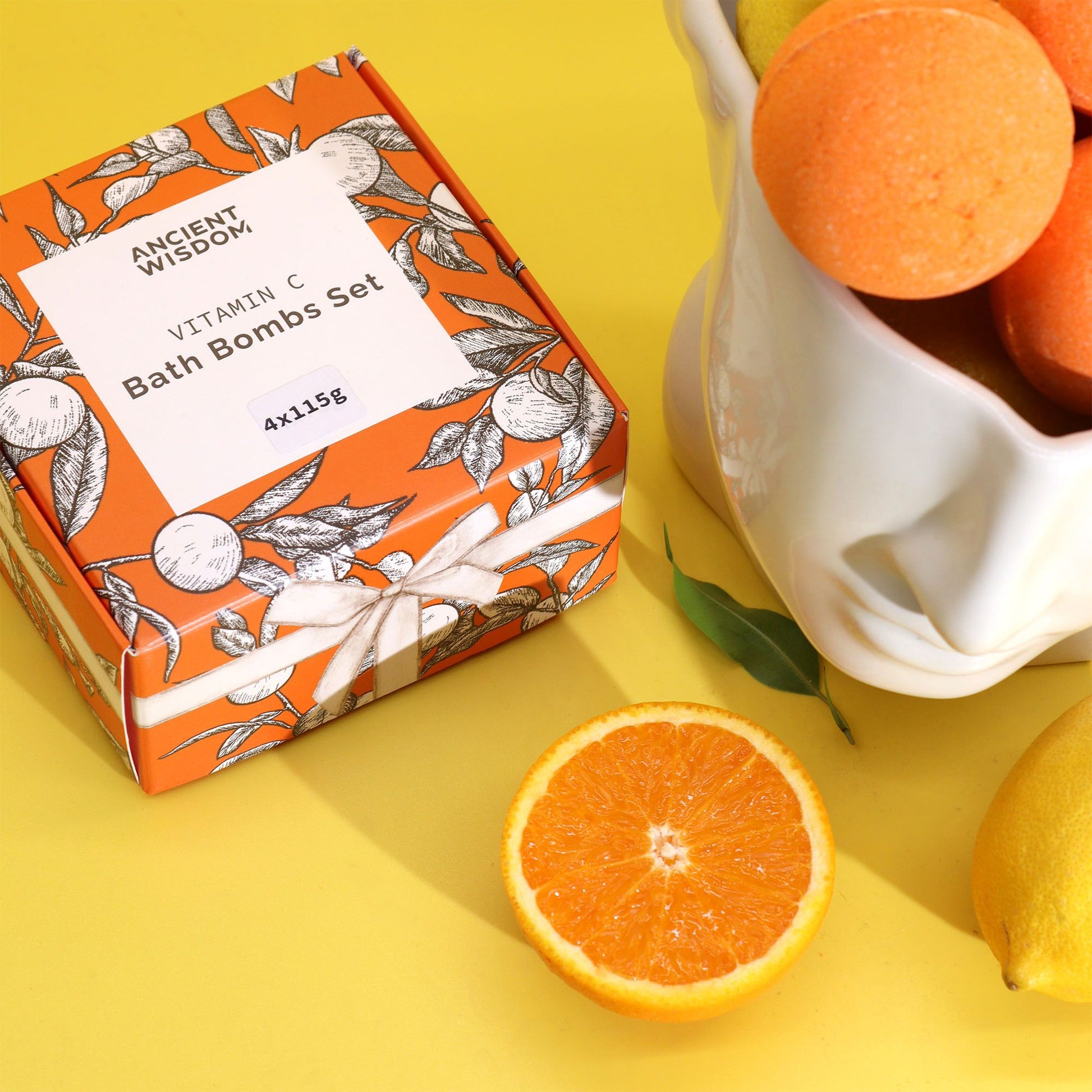 Vitamin C Badebomben-Set mit Orangen- und Zitrusmuster.