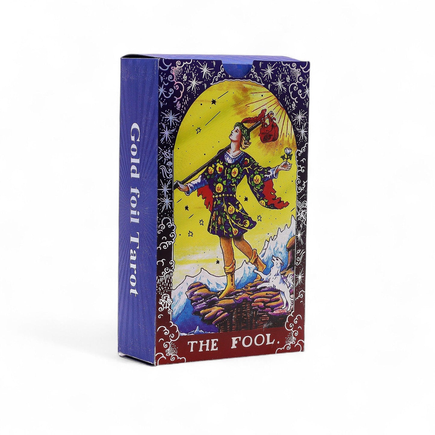 Blau folierte Tarot-Kartenset mit dem Motiv "The Fool" und einem Begleitbuch.