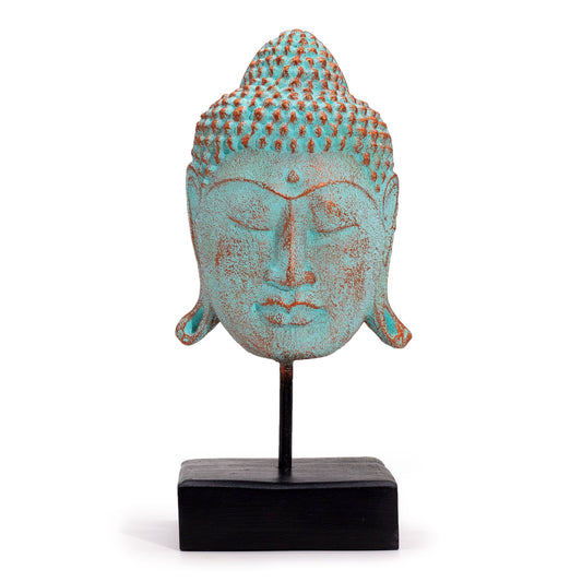 Grüner Buddha-Kopf mit Kupferpatina auf schwarzem Holzsockel.