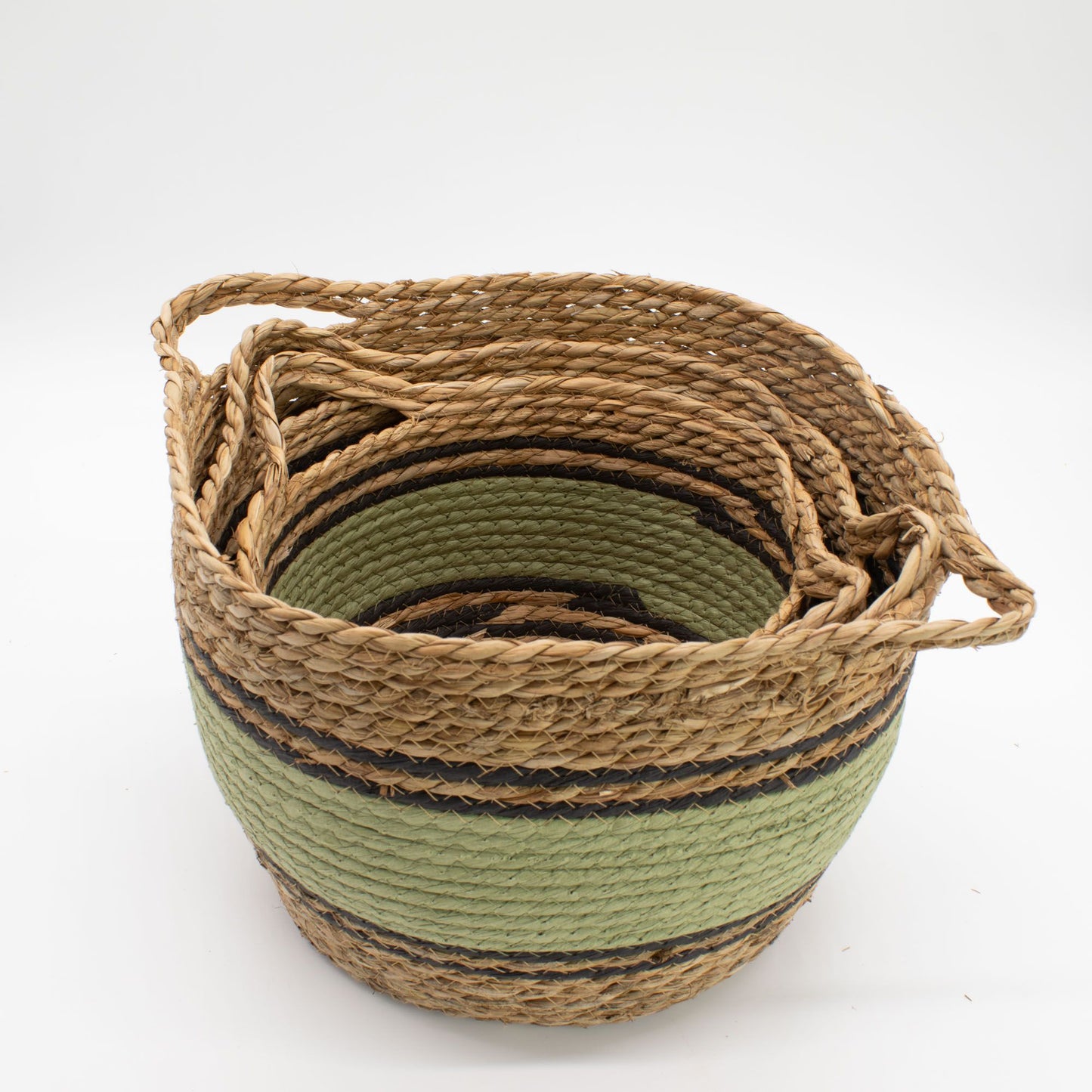 Set of 3 natural cotton and seagrass baskets with black and green bands.