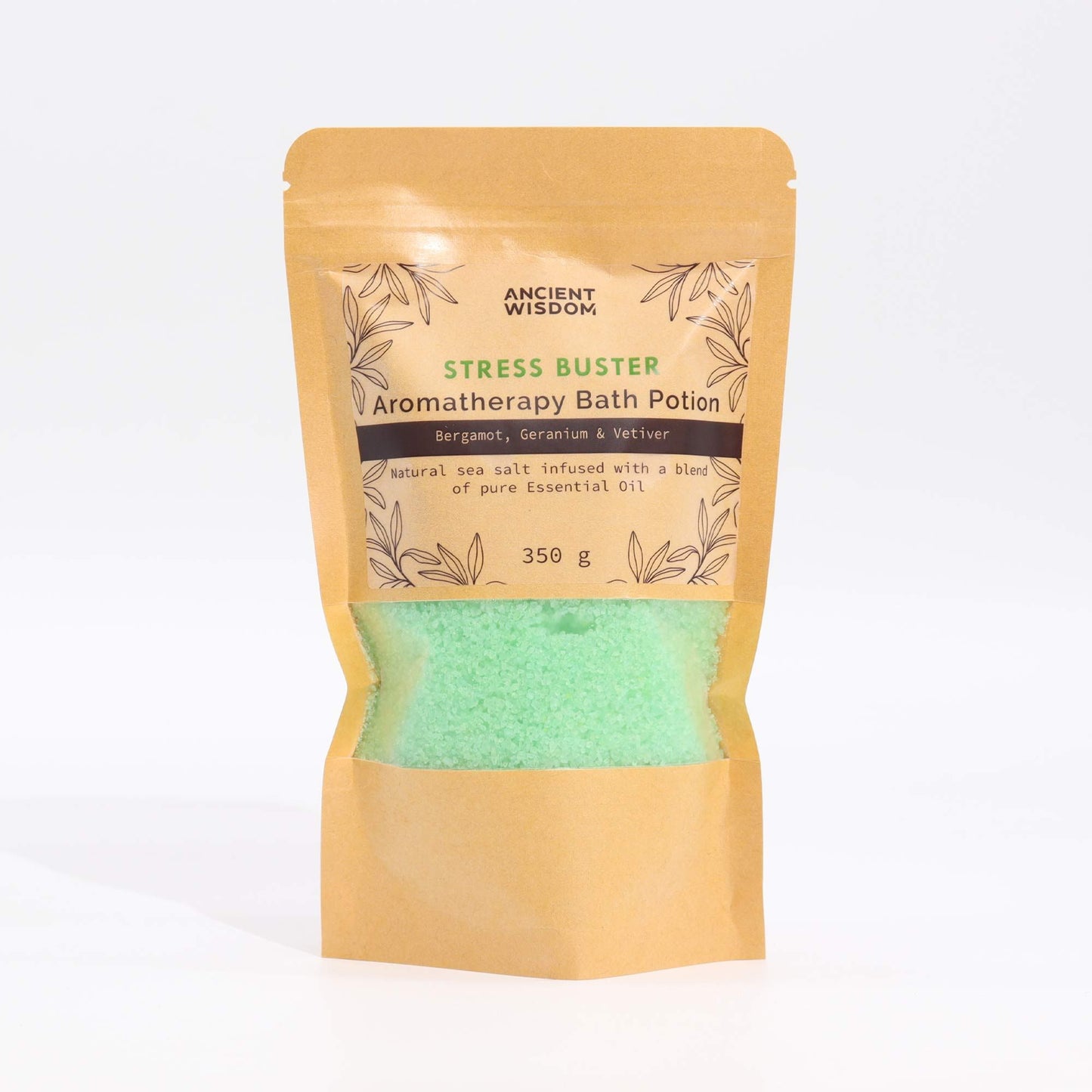 Kraft bag of green aromatherapy bath salts labeled "Stress Buster".