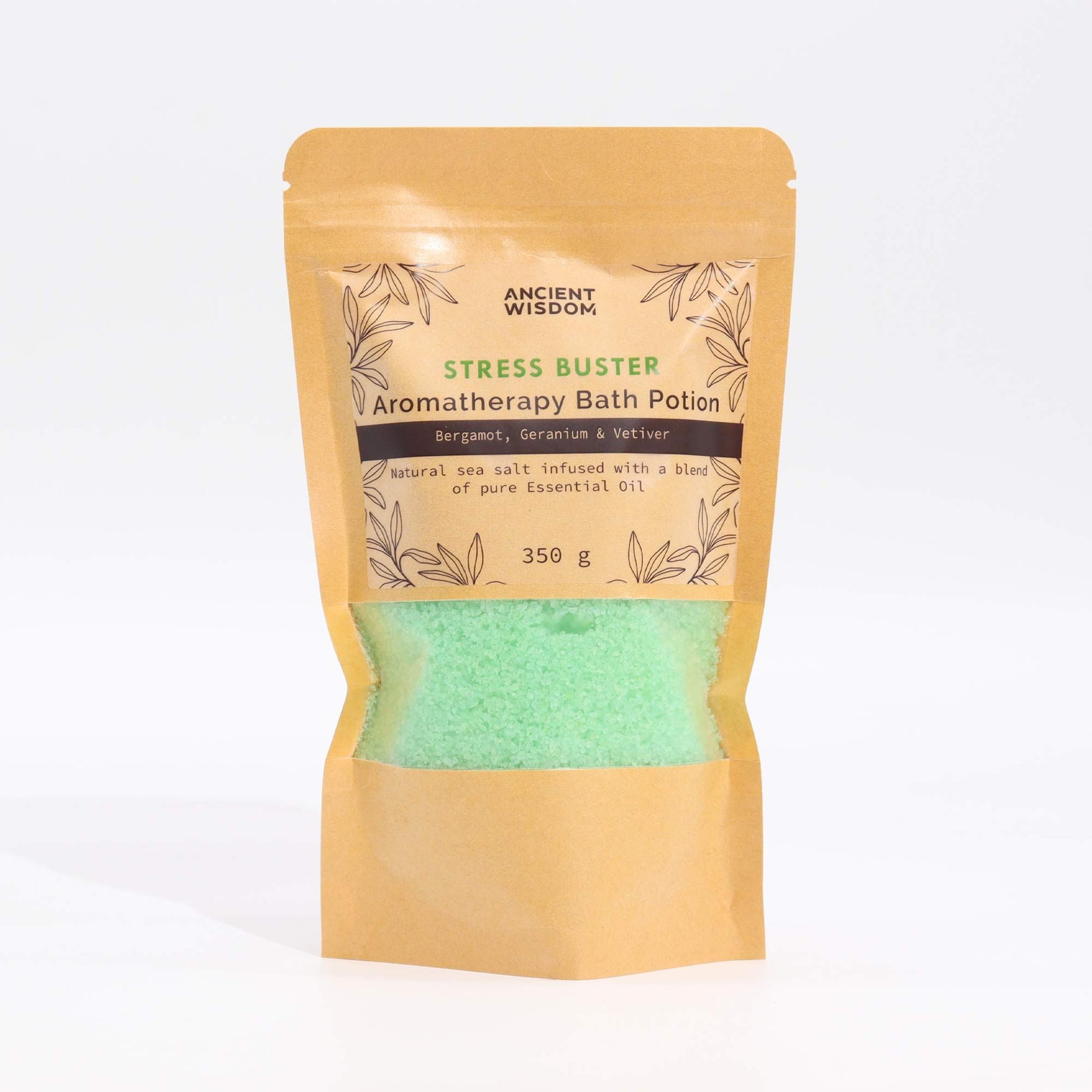 Kraft bag of green aromatherapy bath salts labeled "Stress Buster".