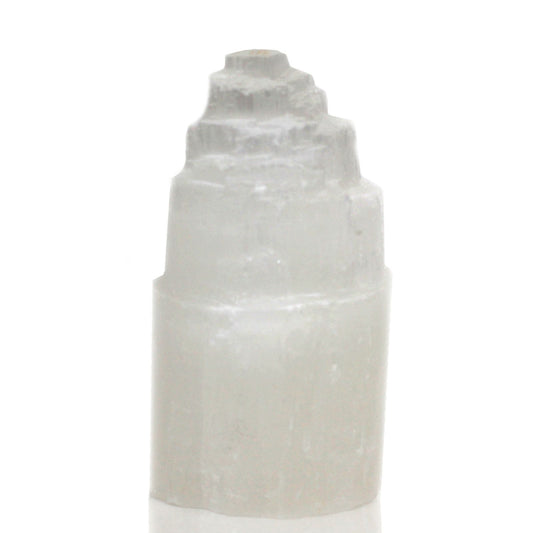 A natural selenite tower lamp with a stepped top.
