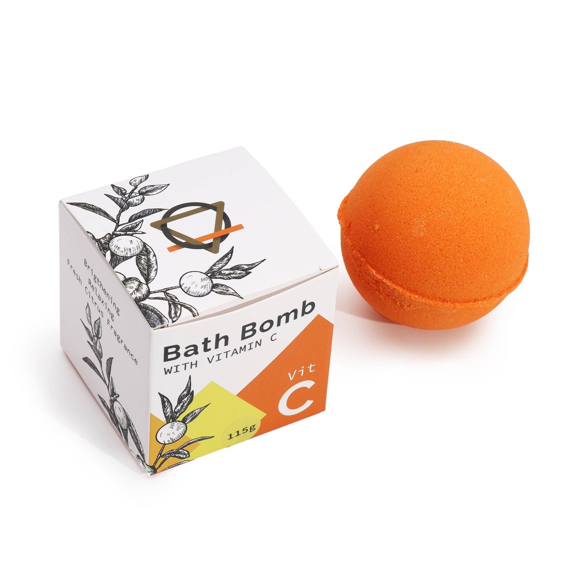 Eine orange Badebombe mit Vitamin C und einer Verpackung mit Zitrusmotiven.