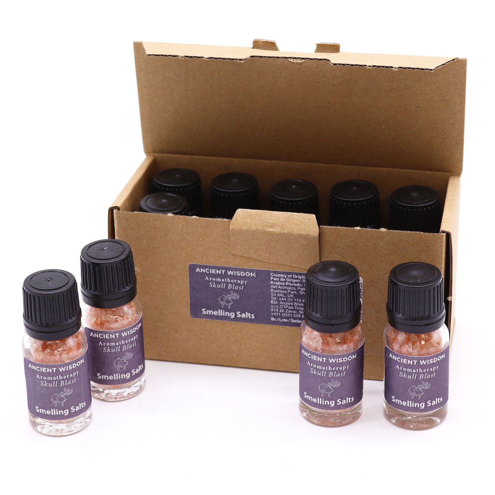 A box of Ancient Wisdom Skull Blast aromatherapy smelling salts with several bottles visible.