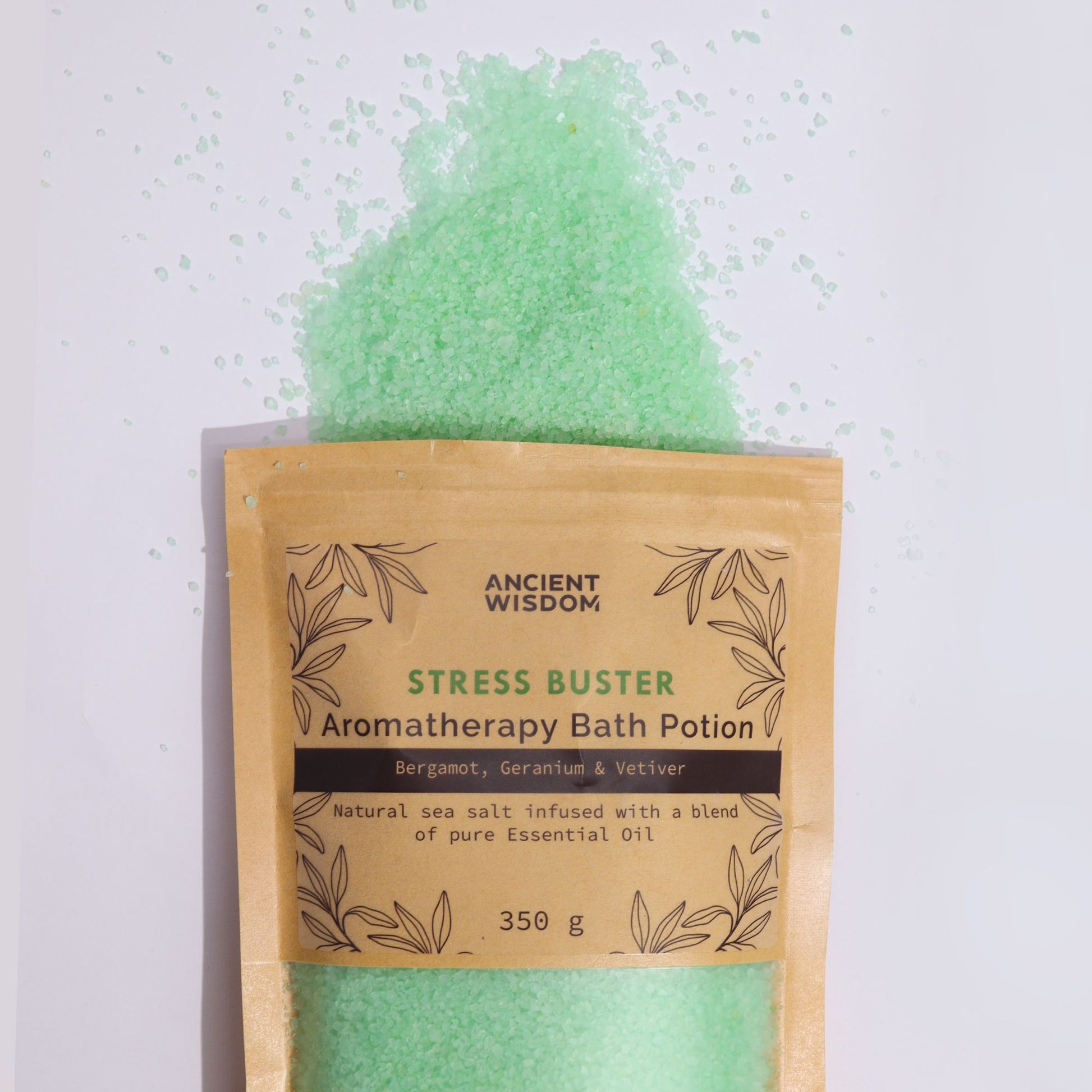 Kraft bag of green aromatherapy bath potion labeled "Stress Buster".