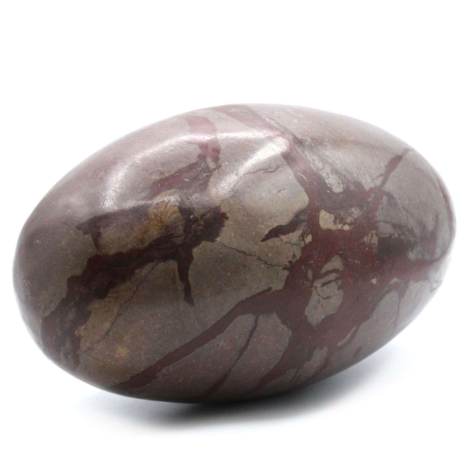 XL Shiva Lingam Stein mit braunen und roten Maserungen.