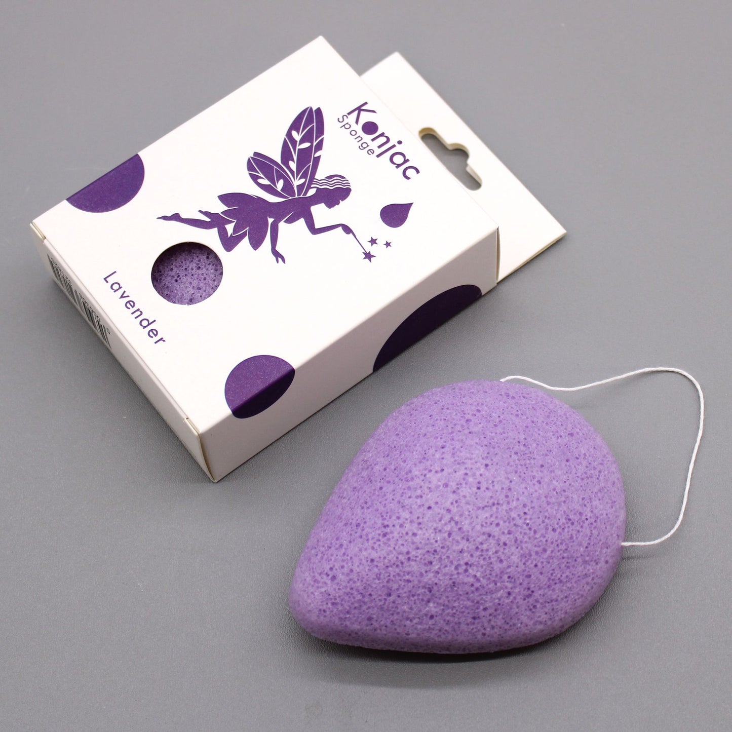 Teardrop-shaped lavender konjac sponge with a white hanging string.