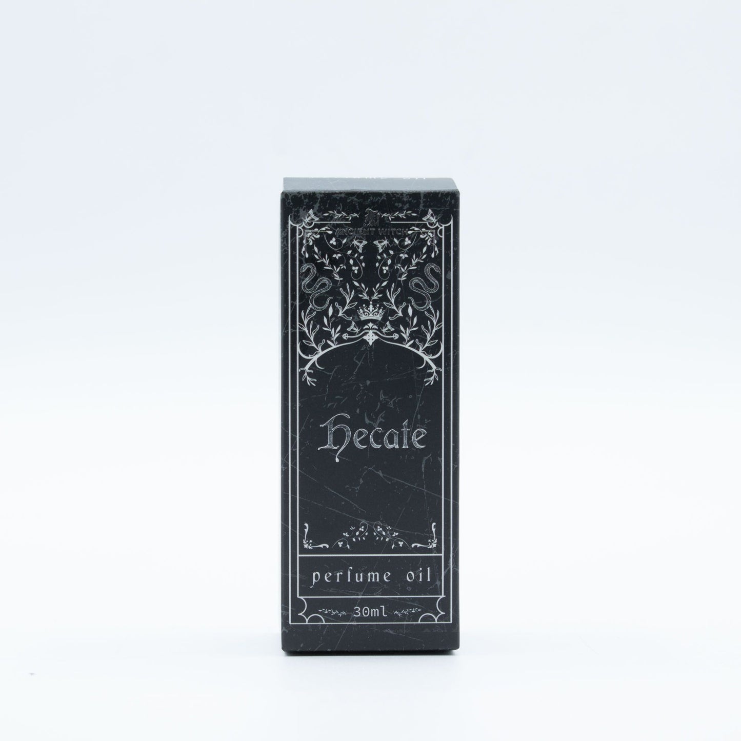A black perfume oil box with white ornate designs and text that reads "Hecate perfume oil 30ml".