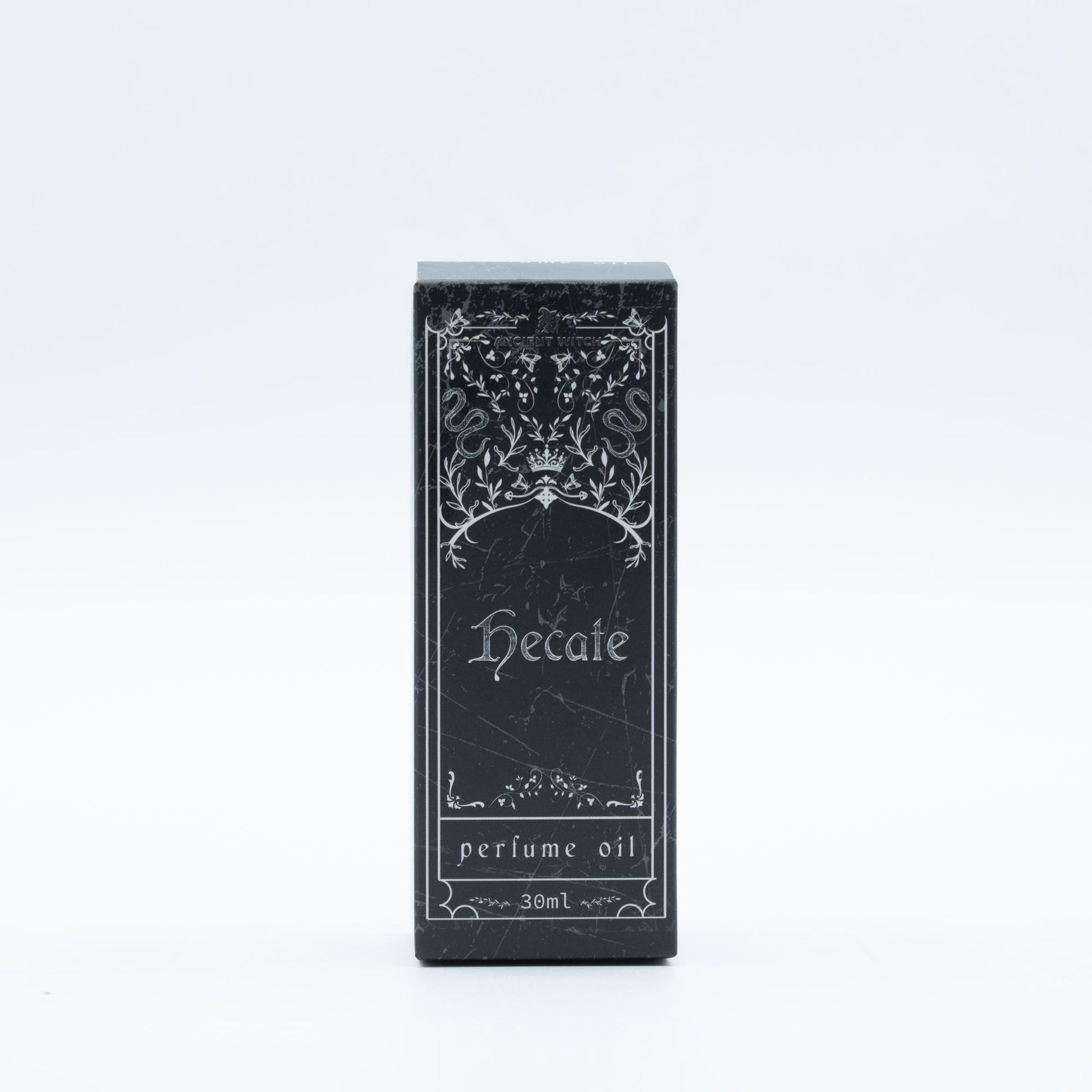 A black perfume oil box with white ornate designs and text that reads "Hecate perfume oil 30ml".